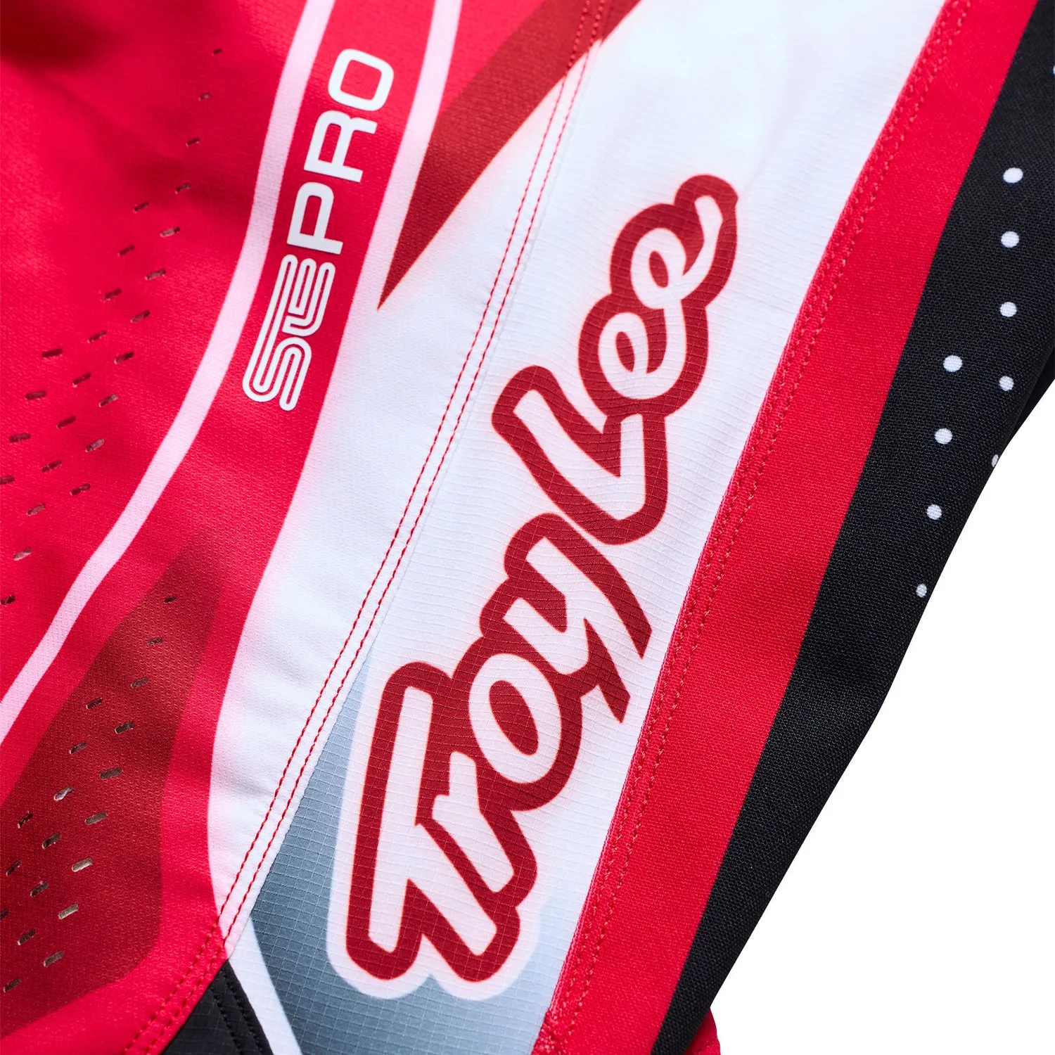 Troy Lee Designs SE Pro Salvo pantaloni moto bimbo rosso bianco