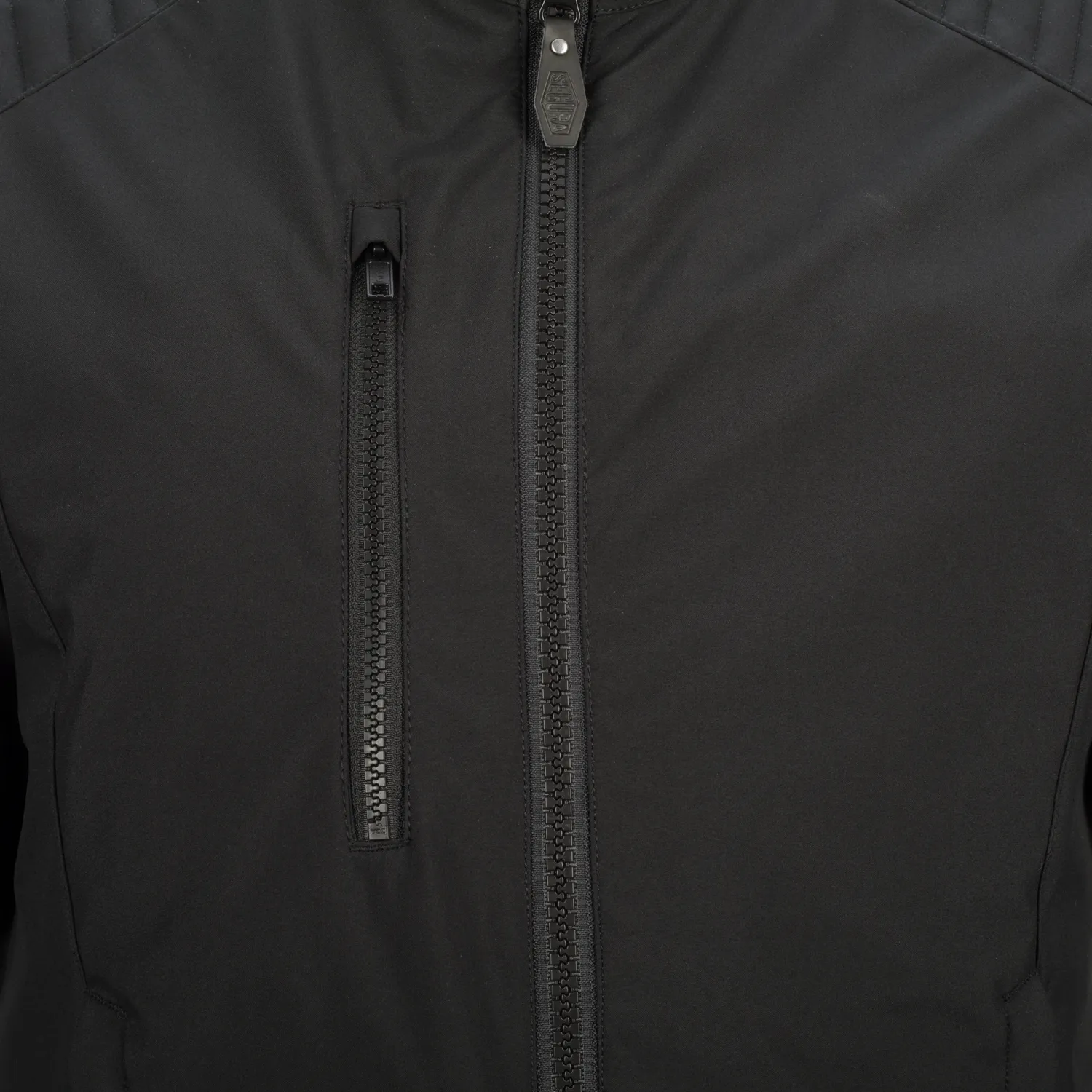 Segura Rebel Polk giubbotto moto nero softshell antivento