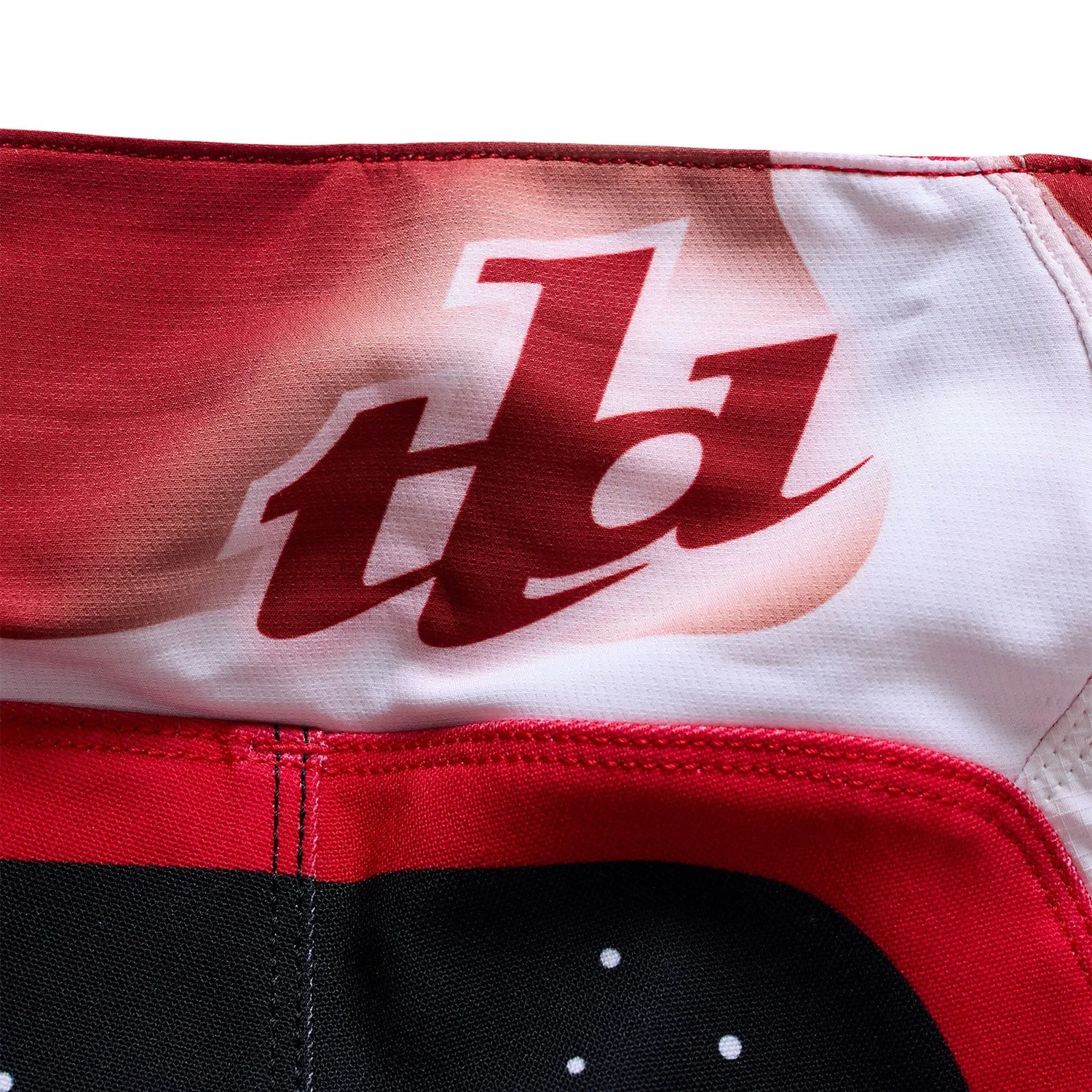 Troy Lee Designs SE Pro Salvo pantaloni moto bimbo rosso bianco